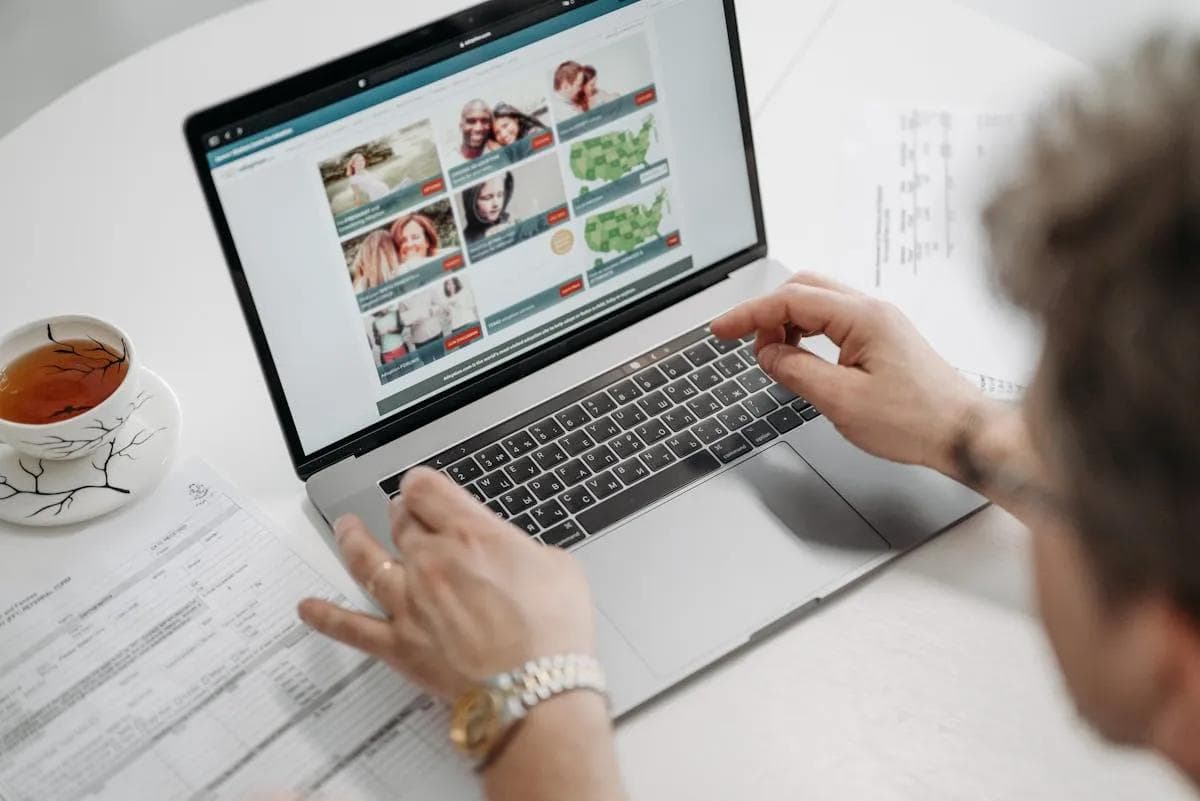 Person researching products on a laptop, illustrating in-market audience behaviour